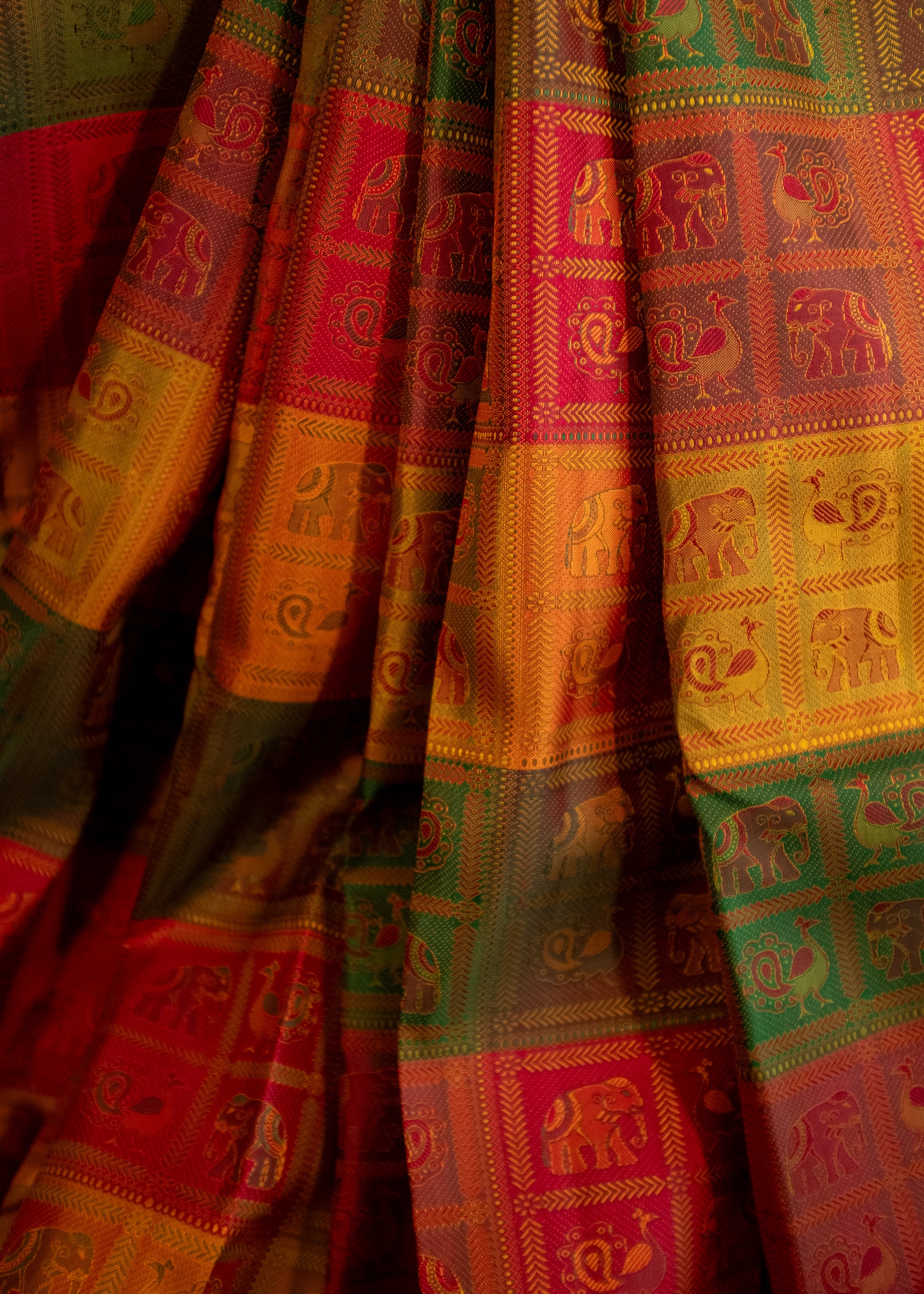 Close-up of multi-coloured Kanchivaram silk fabric texture